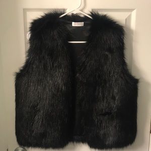 Black faux fur vest